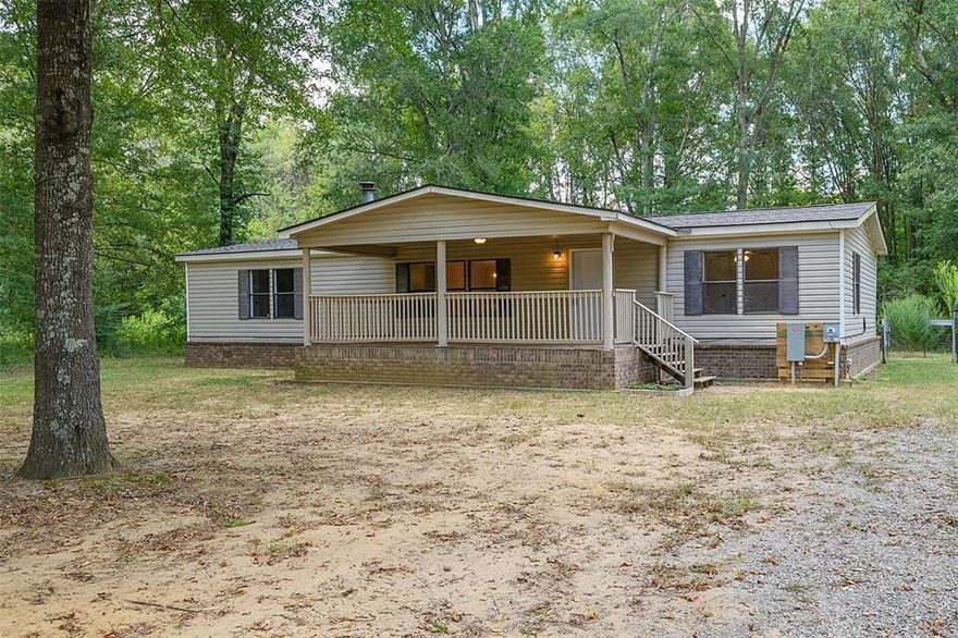 Escape to the country! 1.6 Acres of towering shade trees. Three bedroom home remodeled with new roof, paint, flooring, appliances, HVAC and more. Spacious open floor plan. Worksaver kitchen. Remote primary bedroom and bath.
Covered front and back porches. Must see!