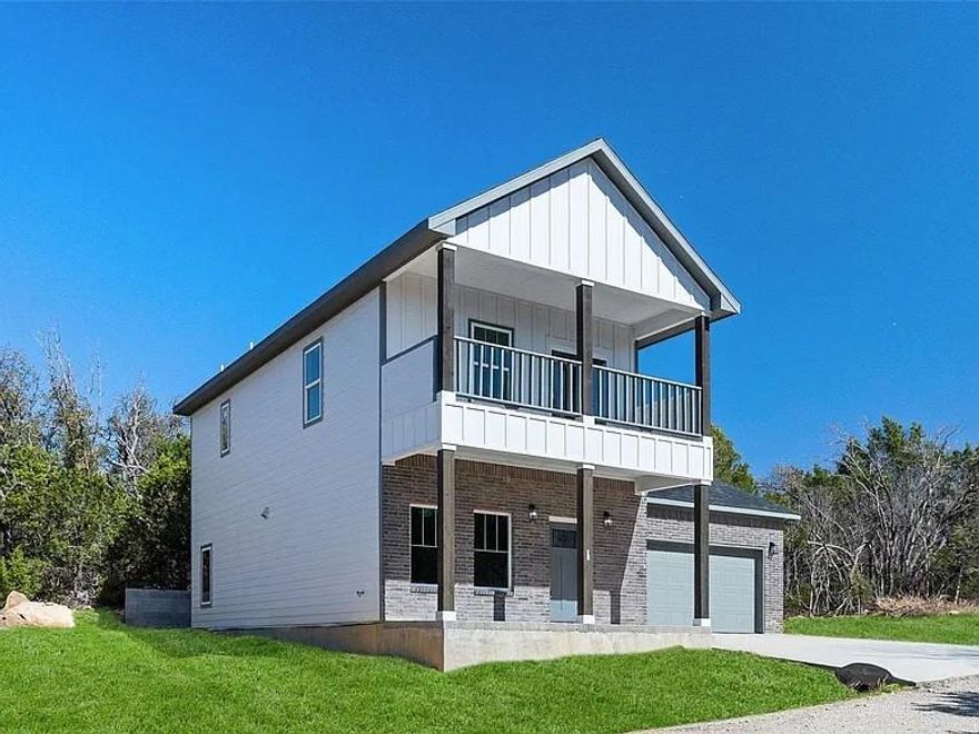 Nestled in the gated Canyon Creek community, this like-new home occupies a prime corner lot, offering spectacular panoramic views of Comanche Peak. The popular neighborhood features a number of amenities, including two pools, a clubhouse, a boat launch, playgrounds, and fishing areas—perfect for an active and vibrant lifestyle. Home offers luxurious open-concept living. Gorgeous luxury vinyl plank flooring flows seamlessly throughout the home.  A modern kitchen boasts sleek quartz countertops, tasteful painted cabinetry, subway tile backsplash, stainless steel appliances, and upgraded lighting and fans. This thoughtfully designed floorplan has a nice primary suite conveniently located on the main level, with a beautiful en suite. Three additional bedrooms (one versatile bedroom or bonus space opens to a private balcony showcasing magnificent views that could serve as a game room, office or tranquil retreat) upstairs. (More Photos Coming) Just minutes from Lake Granbury and Granbury’s charming historic downtown, with boutique shopping, dining, the renowned opera house, and year-round events. Don’t miss this rare opportunity to own a one-of-a-kind home with an unbeatable view in a sought-after community! Schedule your private showing today!