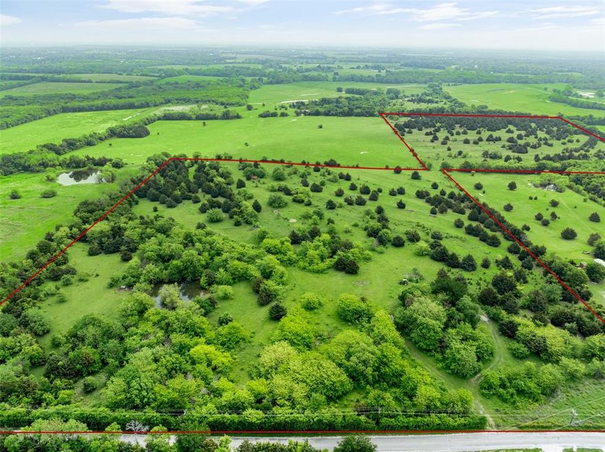 Located just over 3 miles E of Van Alstyne and within A+ Rated Van Alstyne ISD, this 52+ acres offers privacy, nature, trees and views. The unimproved land provides beautiful hilltop views of current pastures and distant views. Located on paved road, this 52 acres of land sits between E FM 121 and FM 3133, and offers easy access to Hwy 5 and Central Expressway. Fenced and gated, land is currently used to pasture livestock, sellers are qualified with ag exemption. There are no known restrictions, expanding the opportunity in this centralized location. Short drive to historic downtown Van Alstyne, shopping, schools, and restaurants. Located in growing Grayson County, you are 15 minutes from Texas Instruments corridor in Sherman. PLUS easy access to Grayson College, medical facilities, Anna, Melissa and McKinney. You get the best of all worlds here, land offering multi-use options, a retreat like setting and minutes to major thoroughfares.