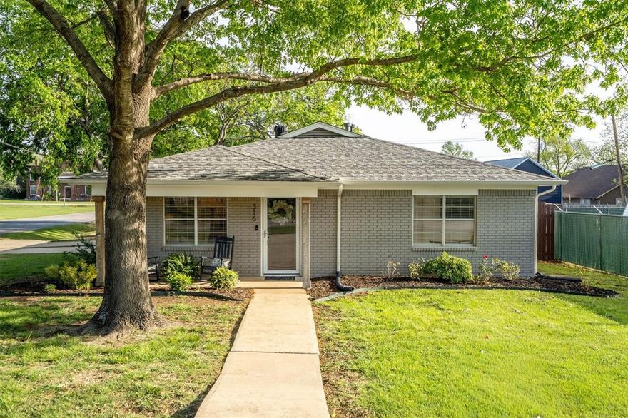 Welcome home! Nestled on a desirable corner lot in Justin, TX, this charming property is shaded by mature trees and beautiful landscaping, creating a warm and inviting first impression. Relax and unwind on the welcoming front porch, perfect for enjoying quiet mornings or peaceful evenings. Step inside to discover a bright, airy interior filled with natural light, offering a comfortable and open feel throughout. The kitchen is a true standout, featuring gorgeous granite countertops, a massive kitchen island ideal for gathering and entertaining, and ample built-in cabinetry for all your storage needs. The spacious primary bedroom provides a private retreat with dual closets, while the ensuite bathroom boasts a newly installed walk-in shower for a modern touch. The secondary bedroom is equally well-appointed, also offering dual closets for added convenience. A full bathroom with generous counter space and abundant storage ensures functionality for loved ones and guests alike. Step outside to a large backyard with plenty of room for outdoor activities, gardening, or entertaining. A storage shed adds even more practicality, giving you extra space for tools, equipment, or hobbies. This home blends comfort, style, and functionality in a fantastic location, don’t miss your opportunity to make it yours!