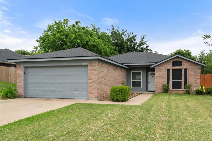 Welcome to this charming and well-maintained home nestled on an oversized corner lot in a desirable Burleson neighborhood. Conveniently located near top-rated schools, a variety of shopping and dining options, local entertainment, and with easy access to major highways (I-35 and Chisholm Trl), this property offers both comfort and accessibility for everyday living.

Inside, you’ll find a thoughtfully updated 3-bedroom, 2-bath layout featuring fresh interior paint and durable vinyl plank flooring throughout, creating a clean and modern feel. The inviting living room showcases a cozy wood-burning fireplace and flows seamlessly into the dining area, offering flexibility in how you arrange and use the space—perfect for entertaining or quiet evenings at home.

The bathrooms have been tastefully updated with stylish finishes, maximizing function while maintaining a fresh, contemporary look. Each bedroom provides comfortable space and natural light, making this home ideal for families, guests, or a home office setup.

Step outside to enjoy the fully fenced yard, offering privacy and plenty of room for pets, play, or outdoor gatherings. The oversized corner lot provides added space and curb appeal, setting this property apart from others in the area.

The garage includes a bonus area at the rear, perfect for hobbies, a workshop, or additional storage—including space for an extra refrigerator or freezer.

This home combines practical updates, a versatile layout, and a prime location—making it a must-see for buyers looking for value and convenience. Additional details in the photos. Buyer to verify all information including schools, lot information and measurements.