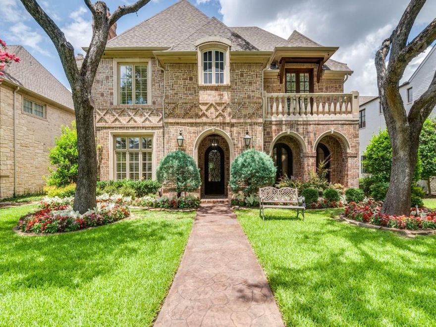 Exquisite Luxury Residence in Prestigious HPISD

Nestled on a picturesque tree-lined street, this exceptional estate rests on a generous 70 x 158 lot and offers over 6,000 square feet of refined living space. With 4 bedrooms, 5 bathrooms, and meticulous updates, this home exudes sophistication and comfort. Recent enhancements include fresh paint, refinished hardwood floors, new carpet, and designer-selected light and plumbing fixtures. The chef’s kitchen is a masterpiece, showcasing quartzite countertops, a striking new island with a built-in microwave drawer, and premium Viking appliances, ideal for both casual living and impressive entertaining. Thoughtfully designed spaces abound, including a private office, media room, game room, custom wine room, and an efficient mudroom connected to the spacious three-car garage. The downstairs study offers versatility, easily converting to a fifth bedroom with its full en suite bath. The luxurious primary suite opens to a serene covered upstairs patio overlooking a manicured backyard with a saltwater pool. Outdoor living is elevated with an inviting fireplace, creating a perfect atmosphere for year-round gatherings. A whole-house generator ensures peace of mind during Texas weather extremes. New LED lighting and top-tier updates make this home move-in ready. Unparalleled luxury, prime location, and a turn-key lifestyle await in one of Dallas’ most sought-after neighborhoods!