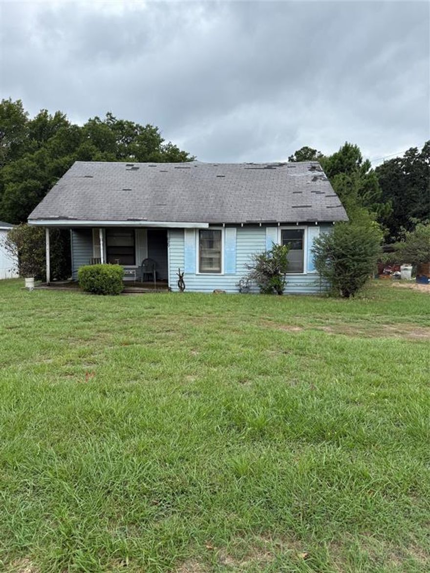 Charming 2 bedroom, 2.5 bath home nestled on a spacious .57 acre lot in the heart of Athens! Built in 1940, this cozy 1,238 sq. ft. home with large lot provides endless possibilities with an additional room that can be converted to another living space or bedroom.  The lot offers room to create a garden, add outdoor entertaining areas, or simply enjoy the extra space and privacy. Conveniently located near shopping, dining, and schools, this property blends small-town charm with everyday convenience. A great opportunity for investors!