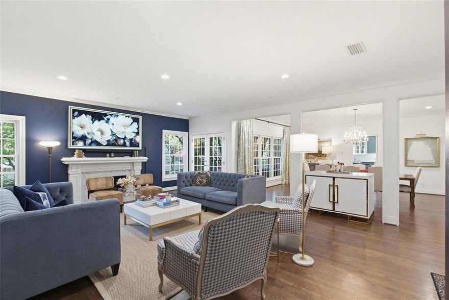 What an opportunity to own an exceptional front corner one-story residence in the coveted nineteen-unit Savoy Condominium in Highland Park and renown Highland Park ISD. On a tree lined street, welcome to a home with traditional charm, modern updates, and thoughtful design. A convenient location within walking distance of shops, dining, and Whole Foods Market, enjoy living in the Town of Highland Park with exceptional city services, parks, and library plus near iconic Highland Park Village and minutes from Downtown Dallas and Love Field.

With the largest floor plan in one of only six front corner units in The Savoy, this 2,033-square foot home has a smartly curated floor plan that provides effortless living and entertaining. The open design with hardwood floors offers an abundance of natural light throughout with tall windows and views on three sides. The private covered front terrace balcony in the treetops is accessed off a gracious living room with fireplace that flows into the dining room with silver closet and dry bar with quartz counters, glass shelves, cabinets, and gold penny round backsplash. A “cook’s” kitchen with kitchen island seating features Carrara marble countertops (sealed with Tuffskin), subway tile backsplash, solid wood cabinetry, stainless Bosch appliances including dishwasher, electric cooktop with double oven-microwave combination, GE warming drawer, and French door Frigidaire refrigerator, custom pantry, and utility closet.

The spacious primary bedroom enjoys a sitting area and large walk-in closet with built-in cabinets. An ensuite spa-like bath is a delight with designer wallpaper, quartz dual vanities with shelves, drawer and cabinets; walk-in shower with multiple shower heads and glass door; and modern lighting and fixtures. Two more updated bedrooms (one with ensuite full bath), and a half bath complete the great floor plan.