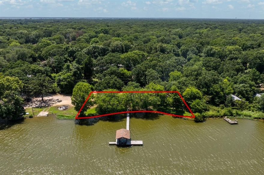 Two Open Waterfront Lots with Stunning Views! Discover the perfect lakefront retreat with two spacious open water lots offering breathtaking views and serene privacy. Nestled among mature trees in a secluded, peaceful area, this property is ready for your lakefront dream home! Private Pier & Boathouse Enjoy direct access to the water with a pier and boathouse in place, offering good water depth for boating and fishing. Utilities Ready  A mobile home was previously onsite; water meter still in place makes future building or RV setup easy. Nature Lover’s Paradise  Towering trees provide shade and privacy, creating an ideal setting for weekend getaways or full-time lake living. For a video tour, search YouTube:
For a walk about YouTube video Google *The Lake Guy CCL 113* Your lakeside dreams begin here!