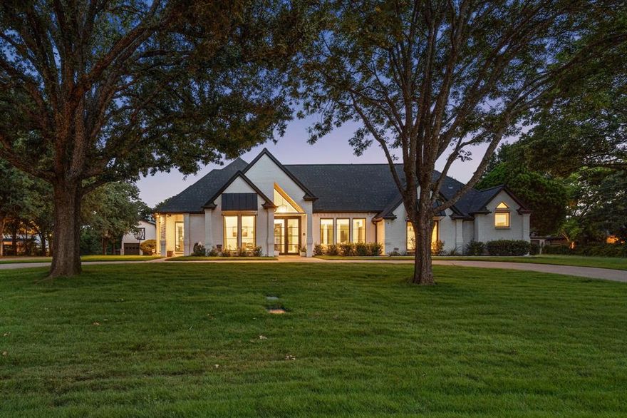 Welcome to this beautifully remodeled home on 1.6 acres, offering plenty of privacy, space, and comfort just minutes from Southlake Town Square, CISD schools, Meadowmere Park, and Hwy 114. Enjoy the peaceful drive home past large lots, mature trees, and views of horses grazing in nearby pastures.
The main floor features four spacious bedrooms, three inviting living areas, a private office, and upstairs you'll find a fifth bedroom suite and another living space overlooking the pool and spa.
Every detail of the home has been thoughtfully upgraded over the past four years, including a stunning new primary bath completed in 2025. Wide plank engineered wood floors, new windows and doors, updated bathrooms, and beautiful lighting create a fresh, modern feel throughout. The kitchen is truly the heart of the home, with a huge 13.5-foot quartz island, custom shaker cabinets with glass accents, top-of-the-line Jenn-Air appliances (including a 48 inch gas range with two ovens, and built-in fridge, freezer, and Perlick wine fridge), plus both a pantry and a walk-in pantry.
The open layout is perfect for connecting with family and friends while still offering everyone their own space. Every bedroom enjoys views of the pool and spa, creating a relaxing retreat for all.
Enjoy outdoor living with a large covered patio overlooking the shaded backyard—ideal for entertaining, relaxing, or planning your dream yard. Animal lovers will love the horses that greet you along the fence line.
Car enthusiasts will appreciate five attached garage spaces, plus two more in the detached barn garage, which includes an upper-level storage area. The home also features a newer roof (2019) and a loafing shed (sold as is).
This beautifully remodeled property combines comfort, style, and a convenient location—ready for you to move in and enjoy.
