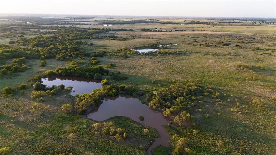 Panther Creek Ranch, a Premier 952.26± Acre Ranch – Gilbert Rd & FM 3428, Nocona, TX
We are pleased to offer an extraordinary opportunity to own 952.26 acres of prime North Texas ranchland, located on Gilbert Road and FM 3428, just minutes outside of historic Nocona. This sprawling property offers a rare blend of productive pasture and wildlife habitat. It is ideal for cattle operations, hunting, or future development. Whitetail deer, feral pigs, wild turkey, and a strong population of bobwhite quail make use of the exceptional habitat. 
Strong native grasses include little bluestem, side oats grama, indian grass, and mesquite grass. 
Well-drained sandy loam soil structures.Bunchgrass and mesquite flats pocked with wild plum thickets. Gently rolling topography and expansive views. The seasonal Panther Creek cuts through the middle of the ranch and flows from south to north. It meanders for over 1.5 miles on the property. 7 total ponds with 3 providing exceptional fishing. Adequate water for wildlife and cattle is found in each area of the ranch
Whitetail Deer and feral hogs make use of Panther Creek to travel from the Red River, less than five miles away. Exceptional habitat supports a huntable population of bobwhite quail. Wild Turkey are also found on the property. Ducks can be found on many of the ponds, and additional waterfowl habitat could be cultivated to create incredible hunting opportunities
Almost 1.5 miles of frontage on the paved Gilbert Road and .5 miles on FM 3428. Perimeter fenced, and a functional set of cattle working pens in the southwest corner. Electricity is available nearby, and strong water well data is available from nearby ranches. 
Location: Located 5 miles from public boat ramps on Lake Nocona - Approximately 1.5 hours from Fort Worth and 2 hours from Dallas - Easy access to US-82 and Hwy 287
This ranch offers a rare combination of size, location, water, access, and usability – a tremendous opportunity.