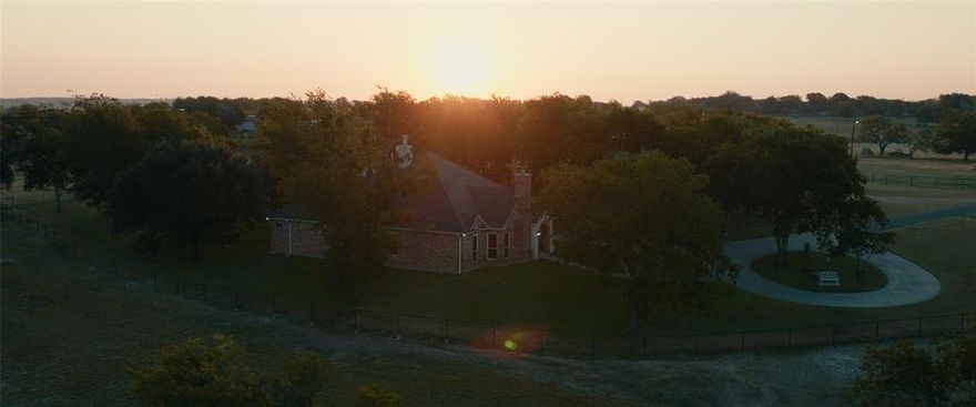Welcome to The PT Ranch, a premier 138± acre property offering a rare blend of end-of-the-road privacy, prime Buffalo Creek frontage, and versatile improvements for ranching, equestrian, and residential use. Located in Johnson County just minutes from Cleburne and within easy reach of the DFW Metroplex, the property features open rolling pastures with mature hardwoods, abundant water, and a well-maintained residence.
Land highlights include 1,170 ft of Buffalo Creek frontage, a seasonal creek with potential for a private lake, 2 ponds, and fenced and cross-fenced pastures ideal for rotational grazing. Improvements include 5 loafing sheds, a set of heavy-duty pipe working pens, and abundant wildlife such as deer, turkey, and hogs.
Equestrian facilities include a 5-stall horse barn with a tack room featuring a sink and water heater, 2 indoor and 1 outdoor wash bays, a separate feed room, and a 25x60 covered awning for hay or equipment. The 30x40 insulated workshop offers electric service with water and sewer stubbed in and an attached 30x40 awning. 
The residence offers 2,690 sqft in the main home plus a 258 sqft loft above the detached two-car garage, connected by a covered walkway. Built in 1998, the home includes 4 bedrooms, 3.5 baths, a study, formal dining, and an open kitchen and living area with center island and built-in gas cooktop. Updates include a new roof (July 2025) and 2 new HVAC units (Sept 2025). Fully wired for network access. Entry features an electric gate and paved blacktop drive (March 2025).
The PT Ranch also offers an easement to a 60-acre coastal field, creating development or subdivision potential while maintaining ranch character. Local attractions & highlights include Lake Pat Cleburne, Cleburne Golf Links, and the Whistle Stop Christmas Parade, ranked among the state’s top events. Designed for both the cattleman at heart and the big-city businessman, The PT Ranch blends working ranch function, modern comfort, and investment potential.