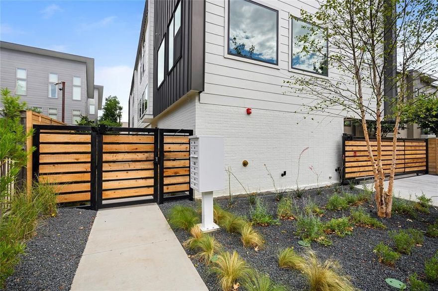 Stunning modern townhomes. First floor attached garage to formal entry. Ascend to the open living area with oversized windows, abundant light, open kitchen with quartz counters & ss appliances, open balcony, light oak color flooring, plus powder bath. The owner's suite is above with a well appointed bath & WIC. Additional amenities: guest suite with full bath, hallway washer-dryer, LED lighting, security, keyless locks, programmable thermostats.