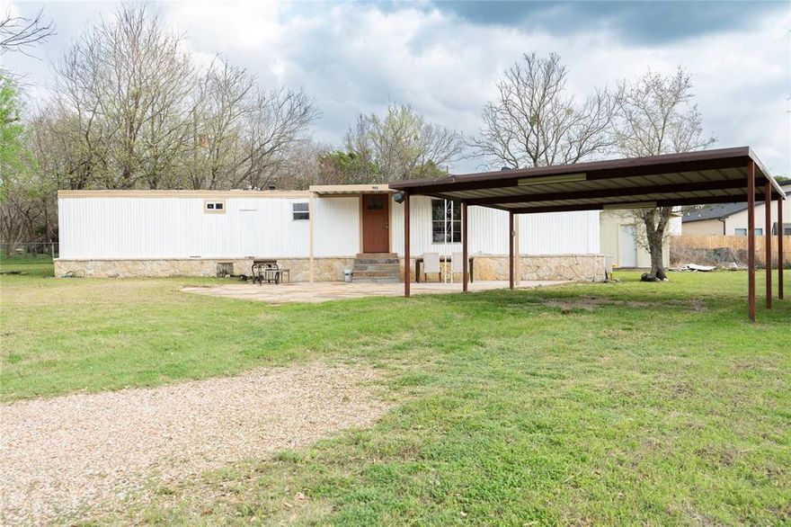 Affordable opportunity in Comanche Harbor – Granbury, TX! This 2-bedroom, 1-bath mobile home sits on approximately 0.36 acres (15,797 sq ft) offering space, privacy, and potential. The home features a spacious living area with a small bar-style countertop, a dedicated laundry area, and recent exterior paint.
Outside, you'll find a metal porch and metal carport, providing covered space for parking and outdoor enjoyment. The large lot offers plenty of room to spread out and includes a treehouse structure, adding character to the backyard. Located in a quiet neighborhood while still being a short drive from the amenities of Granbury.
This property offers a great opportunity for buyers looking for an affordable home, investment property, or weekend getaway.
Buyer and buyer’s representative to verify all information including but not limited to lot size, square footage, schools, restrictions, utilities, and property details.

No Survey.