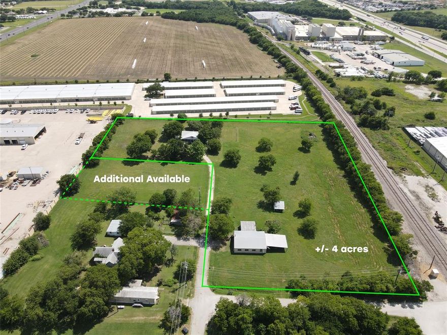 This + or - 4 acre lot is strategically located between N HWY 77 and I-35E off Sterrett RD. Given its prime location between two major thoroughfares and proximity to existing industrial and commercial developments, the property may be suited for light industrial or commercial use with a zoning change required. To the east and south, there's a mix of commercial properties, including self-storage facilities, warehouses, and other mixed use facilities.