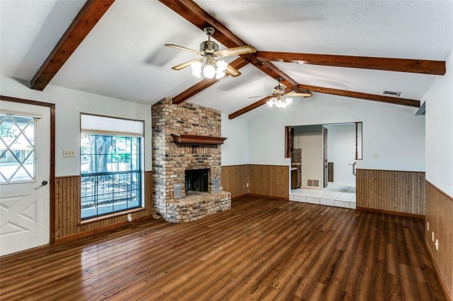 PREFERRED LENDER OFFERING 1% TOWARD CLOSING COSTS!  Welcome home to this spacious 3-bedroom, 2-bathroom residence with 2,040 sq. ft. of living space, nestled on a beautiful 0.25-acre lot. Designed for both comfort and gatherings, this home has been the heart of family life for years and is ready to welcome its next owners.

Step into the warm and inviting den, complete with engineered hardwood flooring, a stunning brick fireplace, and cathedral ceilings that give the home a true country charm. The floor plan flows seamlessly from the main dining area to a second living room at the front of the house, featuring a picturesque bay window. A split-bedroom arrangement offers privacy for guests or family members, while the covered deck on the north side provides the perfect spot for outdoor entertaining and overflow space during gatherings.

Recent updates include fresh carpet, a new dishwasher, refinished kitchen cabinets, a new water heater, and new shingles, ensuring peace of mind for years to come. With its cozy feel and spacious design, this property is ready to be called home. The seller has a survey, but new owner will need to purchase a new one should title require it. Home is being sold as is.  Schedule your private showing today and discover all that 213 S Allen Street has to offer!