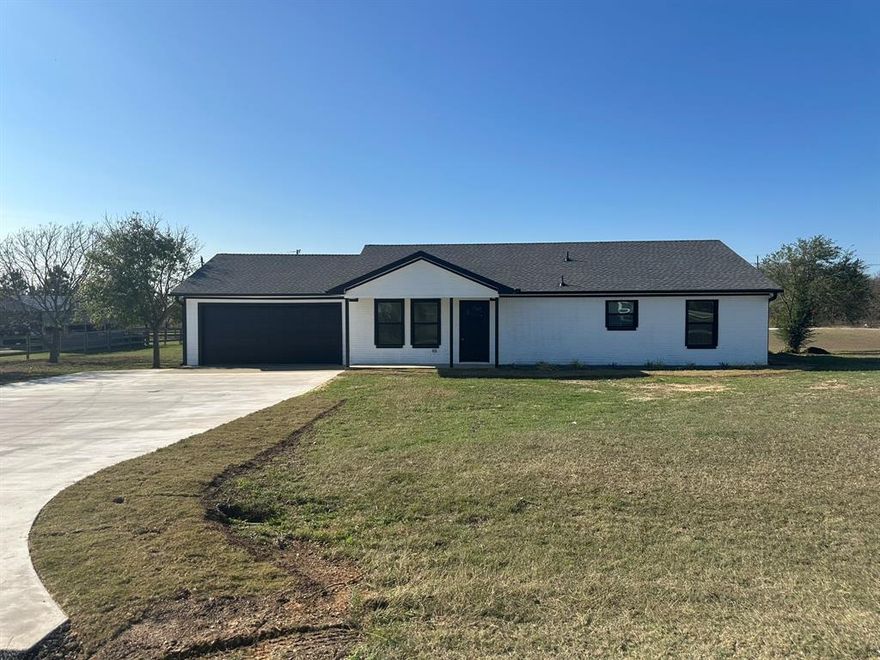 COMPLETELY RENOVATED & MOVE-IN READY – ALMOST 1 ACRE IN TIOGA! Don’t miss this incredible opportunity to own a beautifully remodeled 2-bedroom, 2 full baths home sitting on a spacious corner lot in the heart of Tioga, TX. Every inch of this property has been thoughtfully updated to offer modern comfort, energy efficiency, and effortless living. Step inside to discover a bright, open layout featuring laminate flooring throughout, fresh paint, and all-new lighting and ceiling fans. The stunning kitchen shines with brand-new cabinets, large pantry with extra shelving, granite countertops, and a full suite of new stainless steel appliances—including the range, microwave, dishwasher, and refrigerator. Both bathrooms feel like high-end retreats with ceramic tile floors, tile showers, quartz countertops, electric mirrors, and all-new plumbing fixtures. Major improvements include a new roof, new windows and blinds, new interior and exterior doors with updated hardware, new 3-ton HVAC system, and spray foam insulation in the attic and walls—perfect for energy savings year-round. Additional upgrades like a tankless water heater, new gutters, new garage door with opener, smoke alarms, and a new concrete drive make this home truly turn-key. Enjoy the convenience of city water and sewer. But that’s not all—this property also features an impressive 30' x 40' shop complete with lighting, electrical outlets, guttering, and its own new concrete driveway to the street. Ideal for hobbies, storage, or a workspace! With almost an acre of land, modern upgrades, and a prime Tioga location, this home offers the perfect blend of style, space, and convenience. Move right in and make it yours today!