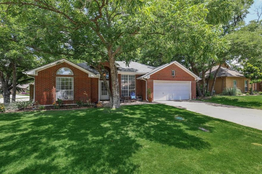 THIS IS IT!!!! If homes were in a beauty pageant, this one would be the queen!!!! ~ Stunningly REMODELED ONE STORY home in Lewisville with THREE CAR TANDEM GARAGE! What?! YES! SO RARE! ~ The current owners have redone this home BEAUTIFULLY and it is MOVE IN READY! (Don't be fooled by the OLD photos you may find elsewhere online! This home has been TRANSFORMED! See our gorgeous listing photos instead!) ~ Redone kitchen with granite counters, breakfast bar, state of the art appliances; PRIMARY bath remodel is a KNOCK OUT!; Guest bath redone also! Beautiful paint and flooring. Stone fireplace. And more more more! Again, MOVE IN READY! ~ The owners have recently replaced the AC & WH also! ~ Corner lot surrounded by a canopy of trees with a great backyard shed wired for electrical. ~ GREAT front patio area perfect for enjoying the evenings. ~ The Primary Suite has two separate closets! ~ Open floorplan, entertains beautifully! ~ WHAT AN OPPORTUNITY!!!!