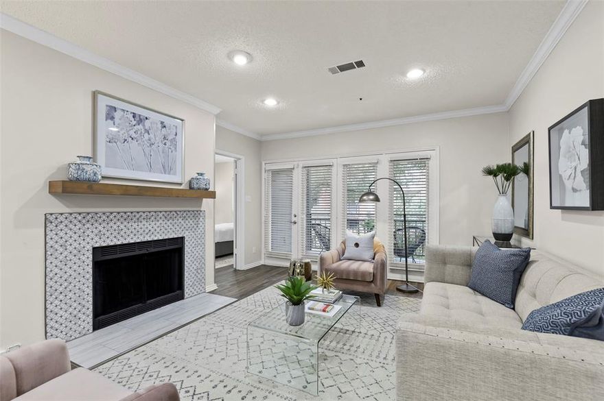 Beautiful two bedroom apartment home in Waterford Place, located in a fabulous neighborhood offering Highland Park Schools.  This spacious & functional floor plan offers an open living space, ample closets, & a private patio. Interior features include luxury vinyl plank flooring, granite countertops, and a wood burning fireplace. Professionally managed and maintained, this boutique community features an underground & gated parking garage and community elevator.  Full size washer and dryer included.