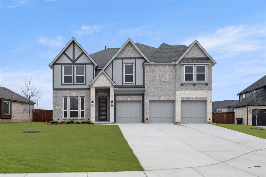 MLS# 20747822 - Built by First Texas Homes - Ready Now! ~ Designed for entertaining, this home features a game room next to the media room and an extended covered patio, perfect for BBQs and gatherings. The gourmet kitchen boasts upgraded double ovens with built-in air fryer, a 36 5-burner gas cooktop, shaker-style cabinets, quartz countertops, and stylish pendant lighting. Modern touches include a 60-inch electric linear fireplace in the family room, a freestanding tub, frameless shower, and black fixtures in the primary bath. Upgraded wood floors span the first floor, with plush carpeting upstairs. Your next home awaits!