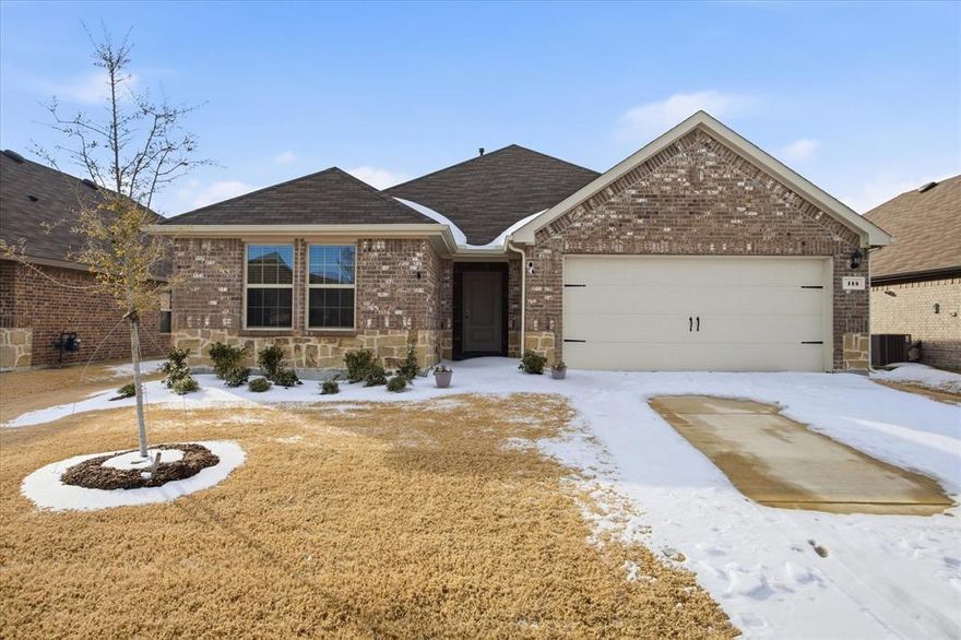 Welcome home to 114 Sunberry Drive. This well-maintained residence offers 5 bedrooms and 2 full bathrooms with a spacious open-concept floor plan ideal for everyday living and entertaining. Luxury vinyl plank flooring extends throughout the main living areas. The kitchen features ample cabinet and counter space, providing excellent functionality and storage, and opens seamlessly to the dining and living areas. The living room is bright and airy, enhanced by abundant natural light. The primary suite is generously sized and includes a private en-suite bath with a separate shower and walk-in closet. Secondary bedrooms are well proportioned and offer flexibility for guests, home office, or additional living needs. Additional features include a tankless hot water heater, water softening system, full irrigation system, and gutters. Conveniently located in sought-after Caddo Mills ISD, within walking distance to the elementary school, and just minutes from I-30, shopping, and dining.