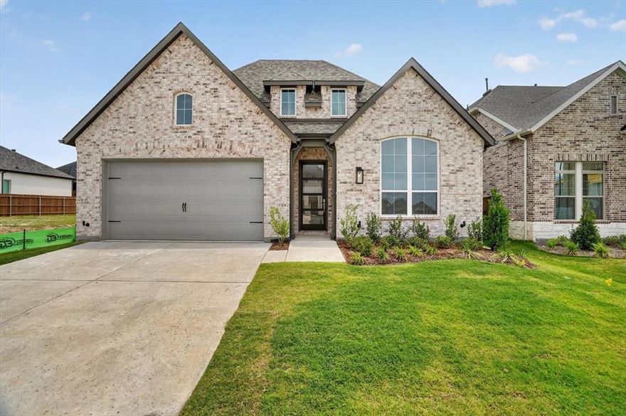 This stunning Highland Homes Davenport plan offers the perfect blend of upscale design, everyday functionality, and modern Fort Worth living. Featuring 4 bedrooms, 3 full baths, and over 2,300 square feet of thoughtfully designed single-story living space, this home delivers both comfort and sophistication in one seamless layout.  From the moment you enter, you’re welcomed by soaring ceilings, abundant natural light, and an open-concept design ideal for entertaining and everyday living. The spacious family room is anchored by a beautiful fireplace and flows effortlessly into the chef-inspired kitchen featuring an oversized island, large walk-in pantry, painted cabinets with glass upper cabinets, and an inviting dining area perfect for gatherings. The private primary suite serves as a true retreat with bay window and a spa-style bath complete with a freestanding tub with separate shower, dual vanities, and generous walk-in closet. Thoughtfully separated secondary bedrooms provide flexibility, and the study offers an elegant work from home space. An extended outdoor living area creates additional space to relax or entertain year-round.