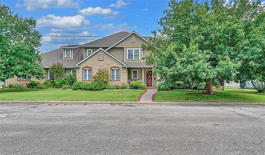 Welcome to 1317 Hackberry Street, a stunning custom two-story home in the heart of Clifton. Set on a desirable 0.43-acre lot, this residence combines spacious design with unbeatable convenience to Clifton ISD and all the amenities the community has to offer.

Inside, an open-concept floor plan seamlessly connects the living, dining, and kitchen areas, creating an inviting space for both entertaining and everyday living. The main-level primary suite features a luxurious bathroom and two walk-in closets. Also on the first floor is the three-car garage, an office, a large utility room, and  a versatile bonus room—perfect for a studio, music room, or guest bedroom.
Upstairs, you’ll find a second living area, three bedrooms, two full bathrooms, a bonus room, and a convenient storage room, offering plenty of space for family and guests alike.

Step outside to your own private oasis with an inviting swimming pool and outdoor kitchen, ideal for relaxing evenings or lively gatherings.

Don’t miss your opportunity to make this exceptional property your own; schedule your private showing today.