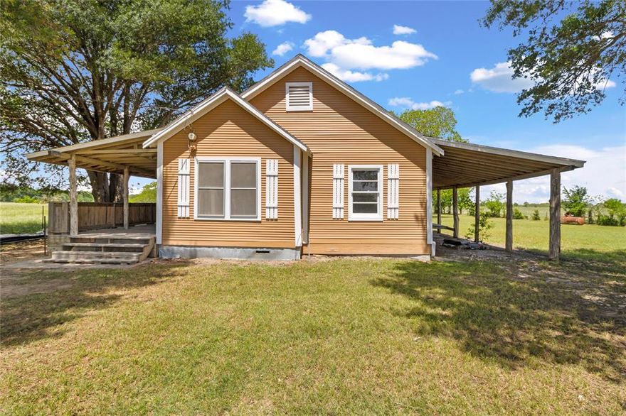 **Seller will install a new tin roof after closing.

Charming Country Home on 1 acre in Kerens, Texas. Escape to peaceful country living this home has three bedrooms and one bathroom on one acre of land surrounded by wide open pastures with grazing cattle that adds to the true Texas country feel. Take in the scenic views right from your spacious front porch, perfect for relaxing mornings and quiet evenings. Inside, the home offers a functional layout with traditional hardwood flooring and luxury vinyl plank in key areas. Fresh interior paint throughout gives the home a clean, modern look, while updated light fixtures add a warm inviting touch. 
Whether you're first-time buyer, downsizing, or investing, this home is a great opportunity in Kerens ready for it's next owner to make it home.
