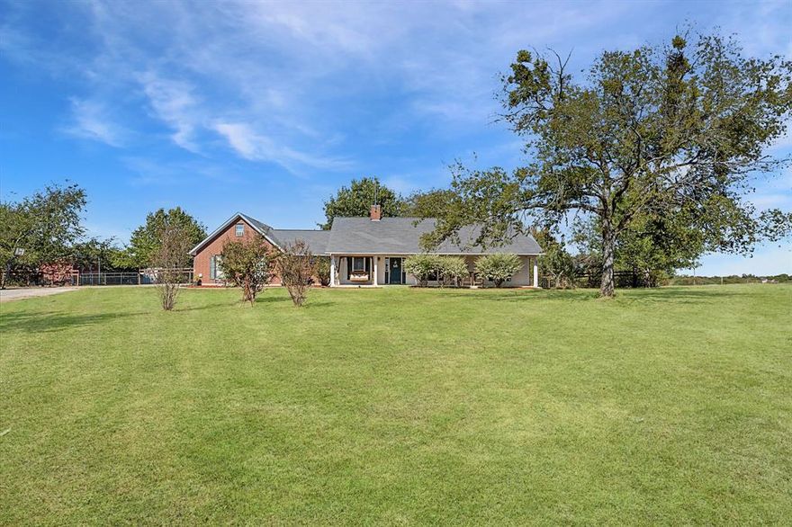 Ready to slow down and soak up the country? Sitting on over 2 fenced acres, this property is perfect if you are longing for a little more breathing room. Step inside to discover a spacious, open floor plan with an inviting layout designed for everyday comfort. The dreamy kitchen features abundant custom cabinetry, ample counter space, and a layout any home chef will love. The home offers large bedrooms, a dedicated mudroom and utility area, and an upstairs bonus room perfect for a home office, craft studio, or music or game room. Out back, unwind on your covered porch overlooking wide-open views, gentle rolling hills, and a perfect spot for morning coffee or evening sunsets. With great neighbors and low-maintenance acreage and easy access to town, you’ll enjoy the best of both worlds: tranquility and convenience. *New roof will be on by Nov 1st