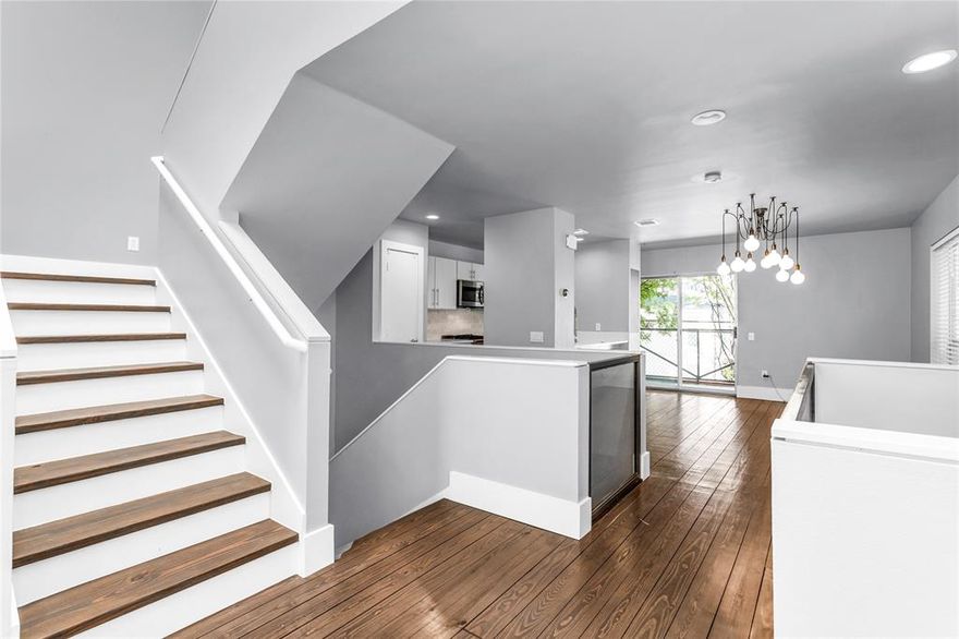 Welcome to a gated Oak Lawn townhome that offers a privacy, luxury, and a touch of urban edge. This 3 story corner unit features a spacious private yard, 2 car garage, and thoughtful upgrades throughout. Entertaining starts on the second level with soaring vaulted ceilings anchored by a marble gas fireplace which flows effortlessly into a designer kitchen with solid surface countertops and a white marble backsplash. Hardwood floors with intentional aged detailing give the space character, while a balcony off the dining area offers the perfect spot for morning coffee. The 1st floor offers a well appointed bedroom with an ensuite bath and flex space to also include a home office as well as direct access to the private yard. The top floor primary suite feels like a boutique hotel as soon as you step through a dramatic oversized glass barn door and take in the fabulousness of the designer molding, accent wall with Jonathan Adler sconces, and a custom walk in closet with built in, remote controlled lighting and space for secured storage. The spa like bathroom is bright and white and features dual shower heads and separate soaking tub. Additional upgrades include a high end security system with cameras and dual alarm panels; one on the third floor for full control, even from bed. Enjoy the walkability to Cedar Springs, Turtle Creek, and the Katy Trail, plus quick access to Love Field, Uptown, and Downtown. With its unbeatable location, rare yard space, and elevated finishes, this home checks all the boxes for a stylish, low maintenance Dallas lifestyle. 

**There is a current lease in place through August 31st 2026, but flexible with vacating at the end of the lease or extending another year.