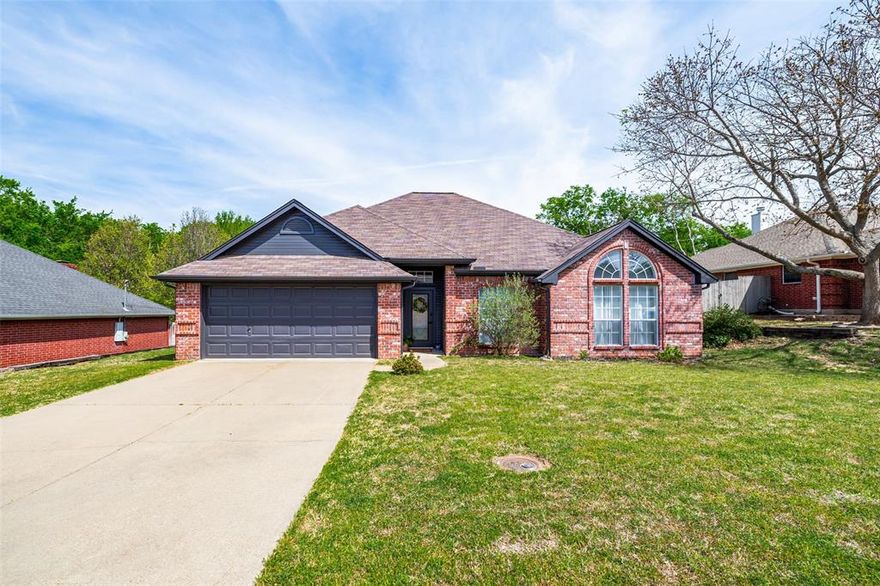 A warm and welcoming 3-bedroom, 2-bath brick home located in a quiet, well-established neighborhood. This beautifully updated property features an open concept layout, perfect for modern living and entertaining. This spacious kitchen flows seamlessly into the main living area, creating a bright and inviting atmosphere. In addition to the primary living space, the home includes a generous bonus room that is ideal for a second living area, home office, home school room, game room or a second dining space. This home presents a desirable split-bedroom layout, offering added privacy and functionality. The spacious primary suite is tucked away from secondary bedrooms, creating a peaceful retreat. It includes a well-appointed ensuite bathroom with a relaxing garden tub, separate walk-in shower and double vanity. The two additional bedrooms are located on the opposite side of the home, making them perfect for family or guests. They share a full bathroom and provide comfortable accommodations while maintaining separation from the primary suite. The home is complimented by a spacious backyard, perfect for relaxing or entertaining. A covered porch provides a comfortable outdoor living area, ideal for enjoying morning coffee or hosting gatherings year round. Thoughtful updates throughout add both style and comfort, make this home truly move-in ready. Whether you're looking for investment opportunity or a place to call home, this one checks all the boxes!