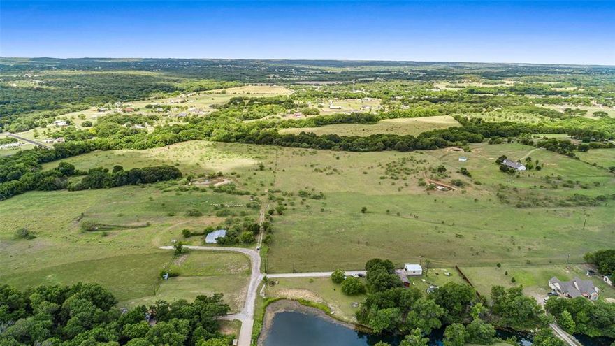 Beautiful Hard to find 71+- acres in Azle on the Parker Co side. Ready for your development or build your own ranch and farm! Heavily treed and entrances from Harvey Trail & Church Rd make this easily accessible.