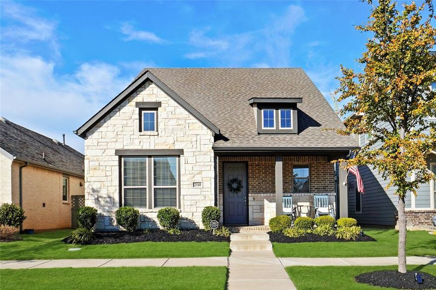 Welcome home to this beautifully cared-for 3-bedroom, 2-bath home in award-winning Pecan Square—a community known for connection, comfort, and an active lifestyle. From the moment you step inside, the bright, open layout and wood flooring create a welcoming space that feels both modern and easy to live in.

The living room is filled with natural light and centered around a cozy fireplace, making it the perfect place to unwind or gather with loved ones. The kitchen blends style and function with white cabinetry, stainless steel appliances, and a large island that naturally becomes the heart of the home—ideal for everyday meals and meaningful moments.

The primary suite offers a peaceful retreat, featuring a tray ceiling, abundant natural light, and a massive walk-in closet. Step outside to enjoy a thoughtfully updated backyard with low-maintenance turf, soft landscape lighting, a walking path, and a covered patio—perfect for slow mornings and relaxing evenings. 

Located just a five-minute walk from The Greeting House, Jackson Hall, and The Arena, this home places you near the center of everything Pecan Square has to offer. HOA includes front yard mowing, internet, and full access to resort-style amenities, allowing you to spend more time enjoying life and less time on upkeep.

Zoned to Northwest ISD, with John Daniel Elementary located within the neighborhood, this home offers not just a place to live—but a place to truly belong.