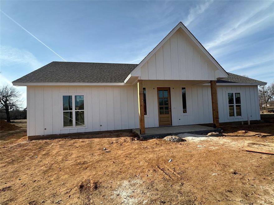 Welcome home to the cutest 3 bedroom, 2 bathroom new build on 1.55 acres. Farm house style home features an open living and kitchen area with stained cabinets. To the right in the home are two guest rooms with a full bath, and primary suite and bath are to the left. A large utility room with sink is in the back off the kitchen, and the back door opens to a covered two car carport or extended patio for entertaining. Home is energy efficient spray foam encapsulated, comes standard with ceiling fans in all rooms and irrigated sod and a landscaped front flower bed. Property is walking distance to Bowie High School and affords quick and easy access to HWY 287 for an easy commute. This one is worth the look.