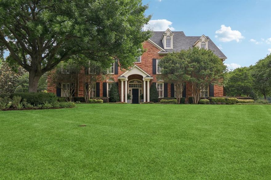 Traditional home on acreage with all of the modern conveniences.  Elegant estate features beautifully landscaped grounds that extend to the Trinity River with a fire pit flagstone patio – perfect for relaxing or entertaining. Rear acreage is efficiently maintained with well water. Enjoy the diving pool and hot tub with outdoor kitchen and seating or private turfed side yard with tranquil koi fountain off the primary suite. Inside the home offers four spacious bedrooms plus a dedicated office-library. Multiple living areas include a main family room, formal living room, and an upstairs game room…providing flexibility for both everyday living and entertaining. The kitchen is equipped with upgraded gas appliances and a Sub-Zero refrigerator, catering to both function and style. Thoughtfully designed with multiple staircases to conveniently access the entire home with ease.  Adjacent to the property, you’ll find the private amenities available to this exclusive HOA including tennis, pickleball and more…enhancing the lifestyle this exceptional home provides. This is truly one of the premier properties centrally located in North Texas – don’t miss your opportunity to make it your own.