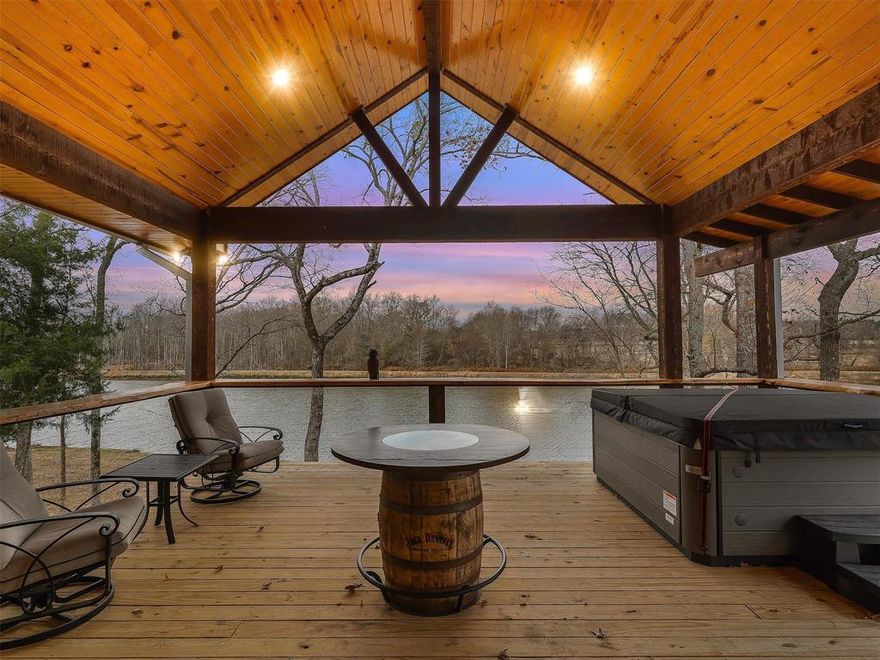 This exceptional 208 acre tract features a stunning 7 acre lake stocked with hybrid bass, complete with a lighted water fountain & fishing pier. A charming log cabin overlooks the lake, offering picturesque views from the large windows & doors opening to the covered deck with spacious hot tub. This peaceful retreat has a large game room, complete kitchen with custom cabinets & countertop. There are two bedrooms, one large bath with walk-in shower, & a loft for the younger folks. The concrete drive circles around a 780 sq ft vaulted carport entrance. The rolling pasture & wooded acreage provide a beautiful blend of open & shaded land, complemented by a productive hay meadow & dedicated hay barn. A 3,500 square foot barn includes working livestock pens, & an upstairs loft ideal for storage & hay. There is a chicken coop, storage container for some rolling stock, & a lean-to for larger equipment. The entire property is newly fenced & cross fenced making it well-suited for agricultural, recreational, or ranch operations. Located in Winnsboro, Texas - Wood County, and about halfway in between Dallas & Shreveport - Bossier City. This is the perfect place for a Homestead or Homeplace for generations.