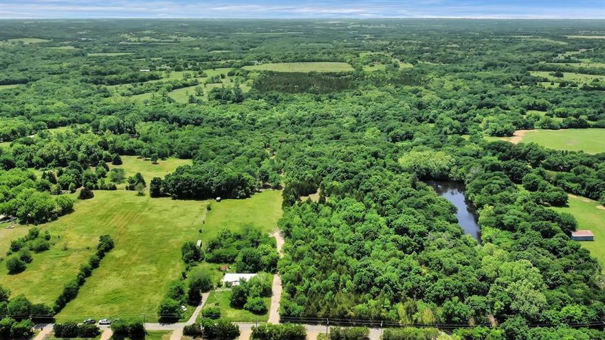 Outstanding opportunity to acquire a remarkable property spanning over 22 acres, adorned with fully-developed trees! It's an impeccable choice for your new home. This expansive acreage showcases enormous oak trees, Choctaw Creek flows through the property, and a plethora of wildlife, creating an idyllic hunting experience!