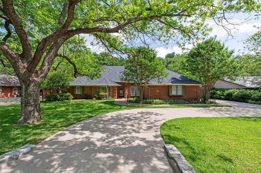 Welcome to this exceptional 3-bedroom, 3-bathroom, 2-car garage riverfront property in Pecan Plantation gated golfing community. This home boasts extensive, stylish updates and upgrades, offering a perfect blend of comfort and elegance. One of the most striking features of this home is the panoramic views of the Brazos River, visible from every room on the back of the house. Handsome engineered wood floors flow seamlessly throughout the living spaces. With 3  stunning fireplaces, warmth and ambiance are never in short supply. The family room and breakfast room are adjacent to the chef's dream kitchen, featuring sleek quartz countertops, abundant cabinetry, and a convenient wet bar and coffee bar. The separate office provides a quiet retreat, ideal for remote work or study. The primary bedroom is a true sanctuary, featuring a cozy sitting area and a beautifully appointed en-suite bathroom. The split-bedroom layout with a Jack-and-Jill bath provides privacy and convenience for family or guests. Step outside to discover a lovely terraced backyard adorned with towering trees and paths leading down to the riverfront. The attractive and sturdy backyard fence ensures privacy and security, while the river irrigation system for the sprinkler system keeps your outdoor oasis vibrant. Additional features include a whole house Generac genearator with 250 gallon buried tank, a newer composition roof & gutters, providing peace of mind for years to come. Don’t miss the opportunity to make this remarkable property your own, where luxury meets nature in perfect harmony. Call and schedule your private showing today! So many amenities to enjoy here--2 golf courses, marina, campgrounds, 2 swimming pools, country club, dog park, tennis, stables and more! Top notch VFD & 24-7 EMS. Minutes from Lake Granbury and historic courthouse square with quaint shops, restaurants, art and cultural events, festivals, and weekend activities. An hour from Ft. Worth. Showings begin April 21, 2026.