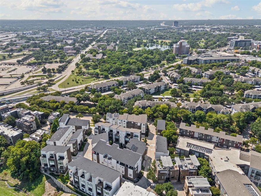 Welcome to your modern townhome in the heart of Dallas! Built in 2020, this 3-bedroom, 3.5-bath home offers just over 2,400 sq. ft. of open, light-filled living space that perfectly balances city life with comfort. The sleek kitchen is equipped with a gas cooktop, stainless steel appliances, and a spacious island—ideal for both daily living and entertaining. Each bedroom features its own private bath, providing flexibility and convenience for families, guests, or roommates. The primary suite includes a generous walk-in closet and spa-like bath with dual vanities and a large walk-in shower. Enjoy a private balcony for morning coffee or evening relaxation overlooking the pool, plus the rare benefit of a 3-car garage with ample parking and Tesla charger. Located in a gated community with a pool, HOA-maintained landscaping, and exterior care, this home offers easy low-maintenance living. All of this just minutes from Bishop Arts, Trinity Groves, and Downtown Dallas, giving you quick access to top dining, shopping, and entertainment.