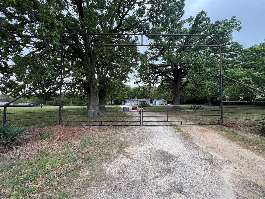 Looking for a project with potential? This 2.79 acre property in Rains County is just minutes from Lake Fork Reservoir and offers a great opportunity for investors or those ready to create their own country retreat. The property features two mobile homes in need of repair, perfect for renovation, rental income or removal to make way for a new build. The land is fenced and includes a pipe entryway, adding both function and curb appeal. Additional improvements include a carport with an attached storage room and a separate storage building, giving you plenty of space for tools, equipment or hobbies. Large mature trees provide shade and a peaceful rural setting. Whether you're looking to fix and flip, create a rental property, or build your dream home near one of East Texas' premier fishing lakes, this property has the location and potential to make it happen. Property is being SOLD AS-IS! Seller will do NO REPAIRS!! Property is being sold with the value in the land!