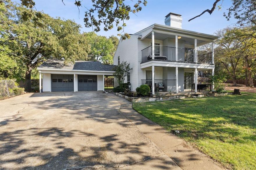 Rare opportunity to own a lake house in Hickory Creek with an upper and lower covered patio! Sitting next to the Point Vista Park as well as the Point Vista Boat Ramp. Light and bright feel this home is a perfect getaway. Tucked back on a quiet street with views of Lake Lewisville. Living room with a gorgeous white washed, brick fireplace with wood floors that flow into the dining & kitchen. Dining area with glass sliding doors takes you out to your relaxing front porch looking at the water. Kitchen with granite countertops, stainless steel farm sink with room for a second dining table. First floor bedroom & bathroom. Upstairs offers two oversized rooms and one bathroom. Primary bedroom with wood burning, brick fireplace with a white wash finish. Primary has sliding glass doors to your private covered balcony to enjoy the lake views. 2 car garage with a covered breezeway into the home. Back yard has been re-graded & leveled. New roof installed in 2021. Solar panels with a direct feed.