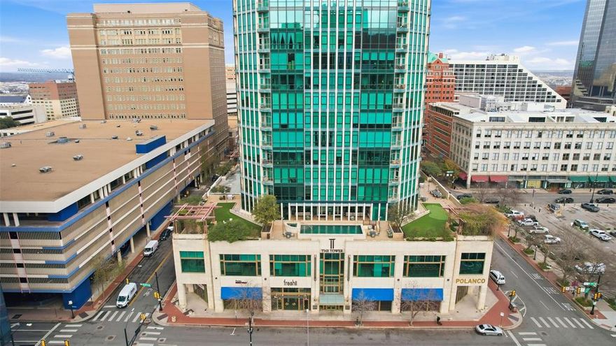 See the amazing View from the 26th floor! 
Come, live, dine and relax in this centrally located premier building in downtown Fort Worth.
This completely remodeled condo offers a beautiful north view of the Trinity River within walking distance of Sundance Square, shopping, fine dining, and cultural venues.
The kitchen is a chef's dream with all new appliances: Viking gas range and dishwasher, a Jenn Air refrigerator, a waterfall granite countertop, custom cabinetry, and plenty of thoughtful storage, as well as a new LG washer & dryer.
As a special treat, the seller invested in custom electric shades from Shade Innovations, known for the finest in remote-control window coverings.
The living area is bathed in LED lighting and equipped with surround sound speakers. A classic neutral color scheme throughout and designer carpeting in both bedrooms make this a one-of-a-kind home.
This unit features two spa-inspired ensuite bathrooms and a stunning half bath for guests. Storage, organization, and closet space are abundant in this well-appointed unit, as well as having 3 deeded spaces in the private garage. Texas Christian University is a 10-minute drive, and DFW airport is only a 30 minute drive. 
Come see this desirable property!