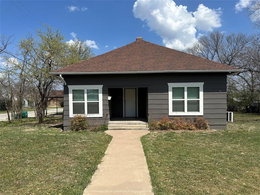This well maintained 3 bedroom 2 bath house sits on a large corner lot.  The home is 1885 sq ft. and is very spacious. The living room has a corner fireplace and the dining room has beautiful built in corner cabinetry.