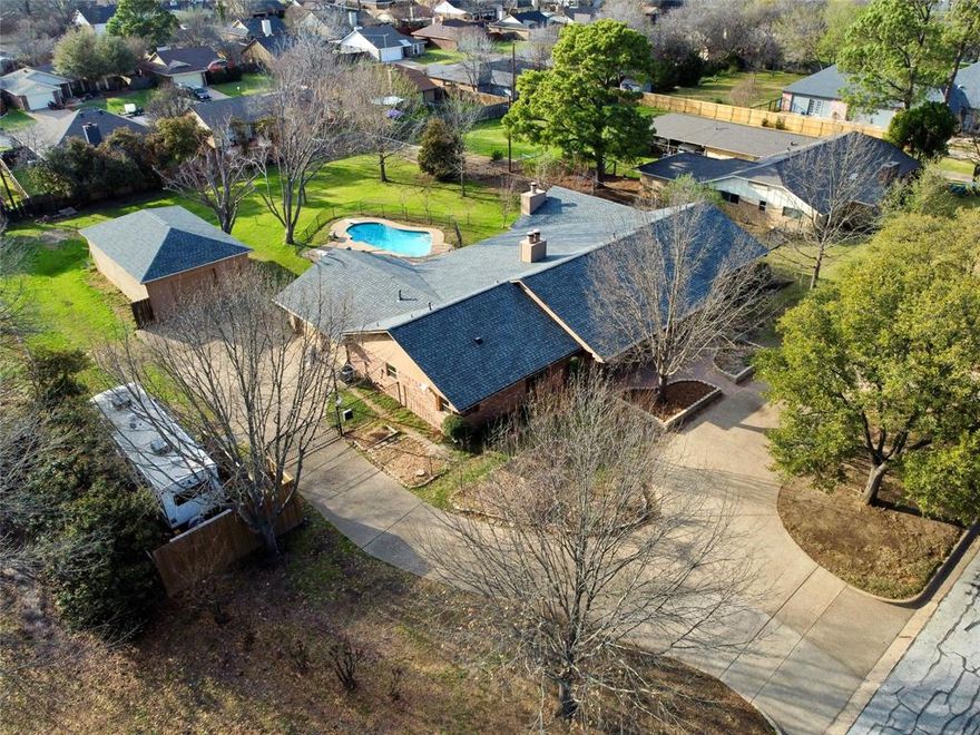 You have the RARE opportunity to own this spectacular single story ranch style home on .631 acres in highly desired Whispering Oaks addition where homes are RARELY listed for sale!!! Great flexible floorplan for large families and multigenerational families that include 5 bedrooms (some could be home office space) 4 FULL bathrooms, 2 living areas, 3 fireplaces, formal dining area (could be a game room or study), HUGE utility room with custom cabinets and a sink-AND MORE!!! Seller upgrades include new roof (2026), whole home generator (2021), HVAC units (2022), fresh interior paint, granite countertops, updated windows, all hard surface flooring, updated lighting-AND MORE!!! Extraordinary exterior features include a circular front driveway, fully fenced yard with electric driveway gate, detached 40'x22' shop, recently refinished gunite swimming pool with recently updated pump-filter-and cover, covered front and rear patios, mature oak & fruit bearing trees, RV parking with electric hookup-AND MORE!!! Great location just minutes to highway 287, Interstate 20, major shopping areas and restaurants-AND MORE!!!