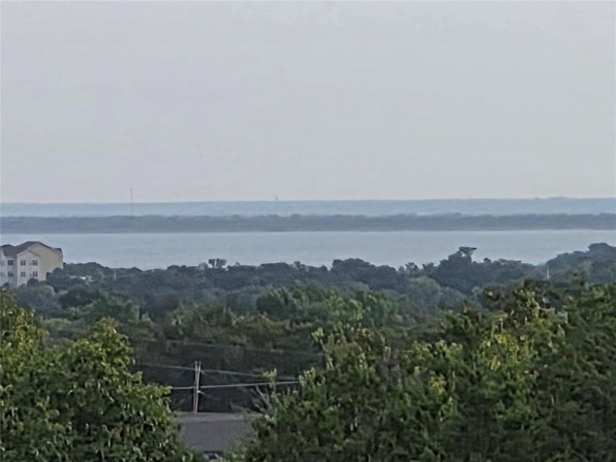 Amazing Views!!! One of the last vacant lots left in Woodway that has such sweeping views of the lake.  Lot is in River Run Estates, no HOA.  Will need to verify all easments, utilites, Etc.  I have been told the City may require an engineered foundation due to this neighborhood being in and escarpment zone. One can only imagine the prestigious sweeping views and open natural light from a home overlooking the vally and facing Lake Waco.  A chance to make an architectural statement. Rare privacy offered in this Peninsula shaped lot!  (All pictures were taken standing flat on the ground)  Owner is a Licensed Real Estate Broker in the State of Texas.