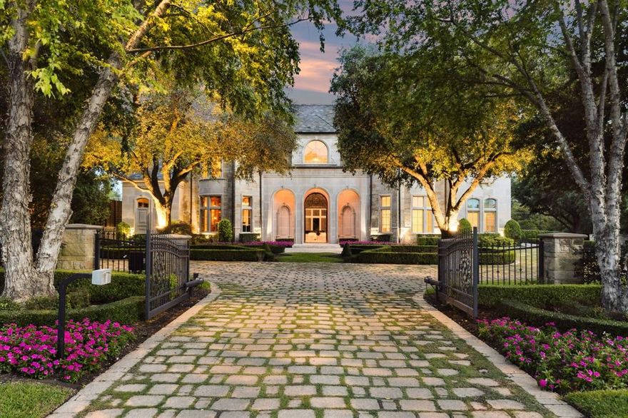 RECENTLY UPDATED! Exceptional gated property on 1.25 acres in Lobello Estates. Built by Crescent Custom Homes, this estate has been impeccably maintained and beautifully updated. Prime location on an impeccably manicured lot with lush grounds, cascading waterfall and fountain. Interior features include first floor primary bedroom with his and her spa like bathrooms, custom closets, downstairs guest suite, study, elevator, climate controlled walk in wine storage and great room with large wet bar. Kitchen has been beautifully outfitted with designer lighting, top of the line appliances and quartzite countertops. Upstairs are 4 oversized bedrooms all with en suite baths, separate mother in law suite with living room and kitchenette, exercise room, gameroom, media room. This home is an entertainers dream with pool, spa, impressive outdoor kitchen. heated patio and beautiful landscaping. Huge additional yard is perfect for tennis or pickleball court. Picture perfect setting in the heart of Dallas near the private school corridor.