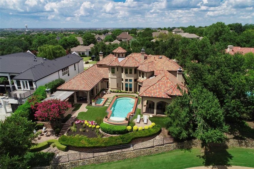 Meticulously maintained Mediterranean-style estate sited on an elevated lot with breathtaking views of the 14th hole at Stonebriar Country Club. This luxurious 7,600+ sq ft residence boasts 5 bedrooms, 7 baths, and an exceptional layout that seamlessly wraps around a private central courtyard with a resort-style pool, waterfall, spa, and expansive outdoor living areas—perfectly positioned for panoramic golf course views and unforgettable sunsets.
Thoughtfully designed with high-end finishes and an endless list of upgrades, the home features 6 fireplaces, rich custom built-ins, two staircases, and multiple specialty spaces including a handsome office, a walk-in wine room, media room, and a spacious game room with an adjacent sitting area and custom office—each with its own fireplace.  Multiple dedicated work spaces and stations make it perfect for those that work from home including the library, upstairs office with fireplace, and work stations adjacent to the kitchen and the in the second floor landing.  The open concept gourmet kitchen is fitted with premium Sub-Zero and Dacor appliances, double sinks, adjacent wet bar and wine room, and gorgeous views of the pool and courtyard.
Additional highlights include a recently installed whole-house Generac generator, smart home automation for remote monitoring and control of lighting, security, and generator systems, and a low-maintenance backyard.  Ample enclosed parking and garage amenities including a two car garage and two additional single car garages, an EV charging station, and a dedicated workshop.
Located within a prestigious gated community, this one-of-a-kind estate blends timeless elegance with cutting-edge amenities—designed for everyday comfort and impressive entertaining.  (NOTE:  Buyers and Buyers Agent to independently verify all measurements and information about the Property)
