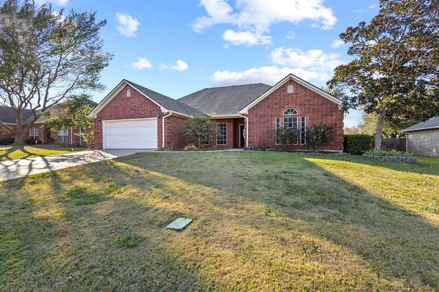 Beautiful 4 bedroom brick home in highly sought after Bells, TX! This property offers a split floor plan, spacious living areas, and a convenient half bathroom. The kitchen features custom cabinetry, granite countertops, and a cozy breakfast room, perfect for everyday dining. The primary suite is filled with details including a tray ceiling, backyard view, and ensuite bath with a walk in shower, jetted tub, and dual sinks. Step outside to enjoy a covered back patio featuring a stunning pool with a water feature providing a relaxing atmosphere. An insulated metal shop with electric offers versatile space for projects, storage, or hobbies. This home combines comfort, functionality, and outdoor living—ready to welcome its next owner!