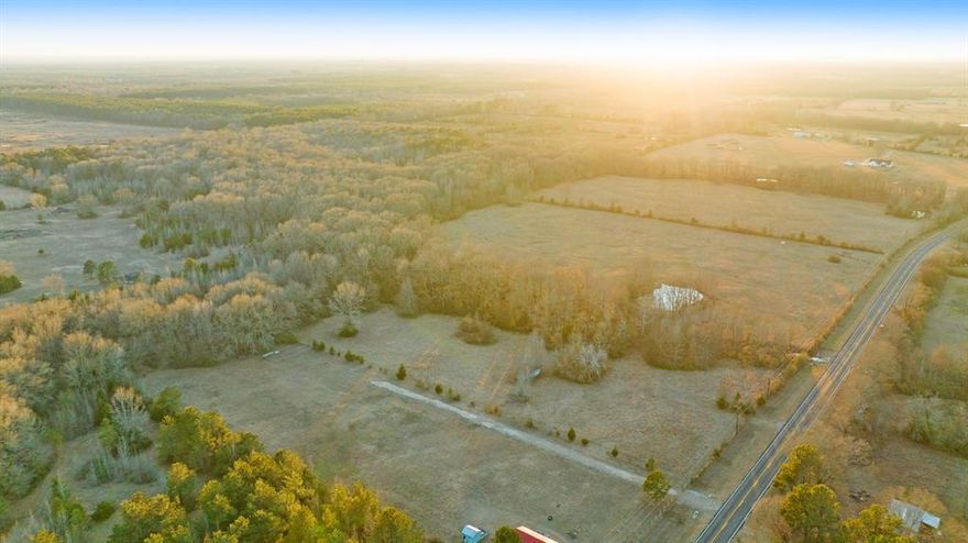 Discover nearly five acres of peaceful East Texas countryside in Avery, TX. This 4.98-acre tract offers wide open space, gently rolling terrain, and scenic rural views that stretch to the horizon. Surrounded by mature trees and open pastureland, the property provides a quiet, private setting with plenty of room to build, relax, or invest.