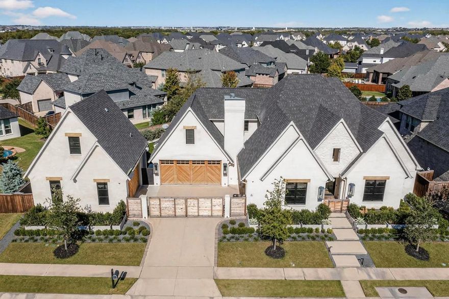 Stunning One-of-a-Kind Shaddock Home in the Coveted Community of Light Farms!
This exceptional property is packed with high-end upgrades and rare features, including a 6-car garage and a fully equipped studio apartment with its own kitchen, bathroom, and living space—ideal for guests, in-laws, or a private office.
Enjoy resort-style outdoor living with a beautiful pool featuring a waterfall wall, fire features, and outdoor shower, plus a turf side yard with a fenced dog run. Relax or entertain on the upgraded TimberTech tanning deck, enhanced by power patio screens, built-in heaters, and elegant gas lanterns. Custom landscape lighting with low-voltage surround highlights the pool and home exterior beautifully.
Inside, you’ll find designer lighting and luxury finishes throughout, along with a private courtyard off the dining room complete with a cozy fireplace—perfect for alfresco dining or lounging.
The spacious primary suite offers a coffee bar and his & her custom closets, while the upstairs features a fully appointed in-law suite with a kitchen, washer & dryer, and a versatile room that can be used as a home gym, game room, or second media room. An additional bonus room upstairs provides the opportunity to add another bedroom and bathroom.
Other upgrades include a whole-home water softener and filtration system, and a full-home Sonos surround sound system—indoors and out.
This home is a must-see to truly appreciate all it has to offer!