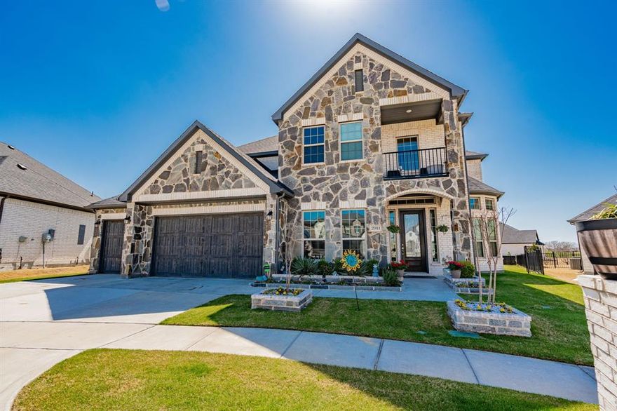 Welcome to this exquisite 3,712 sq ft home located in the prestigious Heath Golf & Yacht Club. This beautiful property features 5 spacious bds and 5 bathrooms, offering luxurious living spaces and elegant designs throughout. The heart of the home is the open concept kitchen, perfect for both entertaining and everyday living. It boasts an L-shaped island, ideal for meal prep or casual dining, and a cozy breakfast nook with a charming coffee bar a perfect spot to start your day. The inviting living room showcases a stone, gas log fireplace, creating a warm and welcoming atmosphere, and is adjacent to the formal 2 story dining room, offering a seamless flow for entertaining guests. Large windows provide stunning views of the upgraded stamped concrete patio, extending your living space to the outdoors. The large primary suite is a true retreat, with a beautifully designed en-suite bathroom that includes a corner tub, a walk-in shower with a seat, and dual vanities. His and her separate closets ensure plenty of storage and privacy. For the car enthusiast or tech savvy homeowner, the three-car garage is equipped with Stage 3 EV chargers, making it a convenient and future-proof addition. On the first floor, you'll also find a private study and a powder room, offering a peaceful and functional space. A circular staircase leads to the second floor, where you’ll find four additional bedrooms and three full baths, ensuring comfort and privacy for everyone in the family. The spacious game room is a highlight, offering a fantastic place for relaxation and entertainment. It opens to a 12'x15' covered balcony with breathtaking views of the Heath Golf & Yacht Club neighborhood and the meticulously maintained golf course. The view of the course is nothing short of spectacular, making this home truly amazing. This is a rare opportunity to own a home that blends luxury, comfort, and functionality in the highly sought-after Heath Golf & Yacht Club. Don’t miss out on  this dream home!