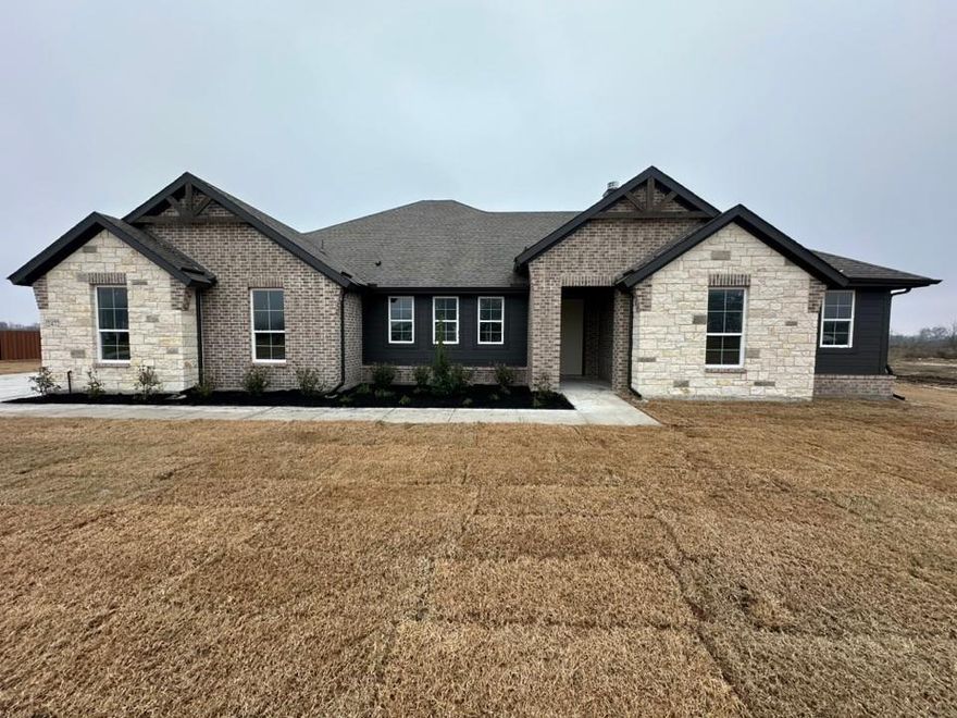 Estimated December 2025 completion! Ask us about our Trade In Trade Up program, we can buy your home! On .88 acre corner homesite and is nestled into the community away from the busy main roads. The 4-bedroom home presents a creative, sensible layout of the home’s 2,426 sq. ft. of living space. The open concept enhances the spacious feeling and makes it easy to have conversations no matter where you are. Including a large center island that doubles your counter space and provides comfortable seating for 4. Just a few steps from the kitchen is a formal dining room,  if formal isn’t your thing, use this as a playroom or a living room. With a few small adjustments, you could convert it to a fifth bedroom. The bedroom is in the back of the home under a tray ceiling. In the bathroom, both a soaking tub and step-in shower, along with dual vanities and a private water closet with an expansive walk-in closet with wooden shelves and racks. The 3 secondary bedrooms on the other side of the home’s layout. Two of them have a walk-in closet, the third one gives more floor space. Third bathroom upgrade. Backs up to tree line.