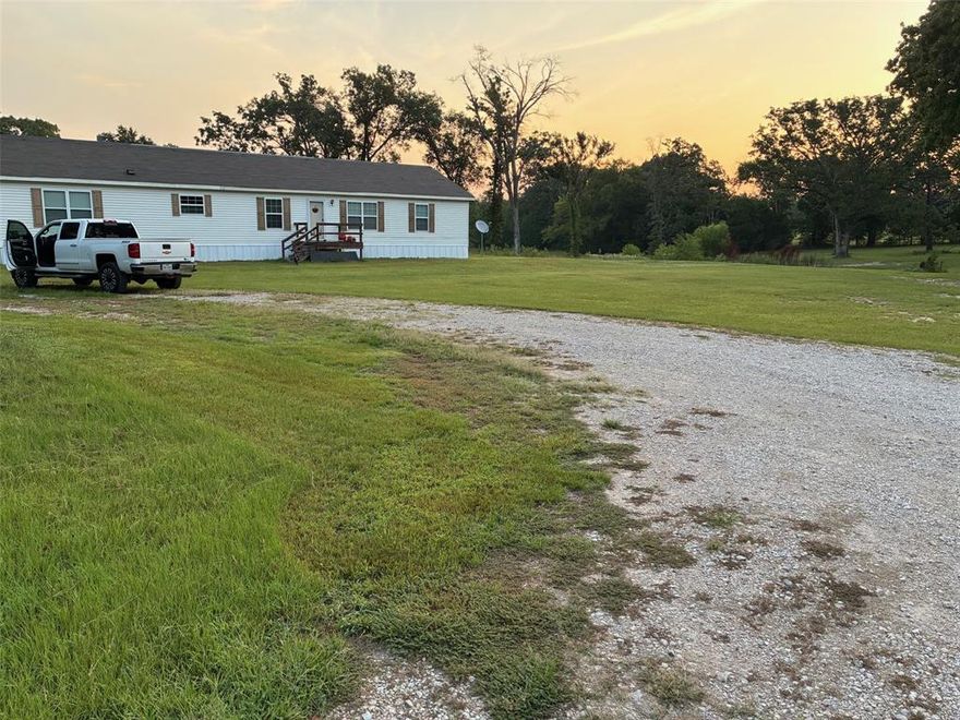 Two Homes on 21.2 Acres
Exceptional opportunity to own two homes situated on 21.2 acres. The primary residence is a spacious 4-bedroom, 2-bath doublewide with numerous upgrades throughout. The secondary residence is a 1,120 sq. ft. mobile manufactured home, ideal for extended family, guests, or rental income.

Contact Listing Agent Brad Rummel for parcel identification numbers and additional details.