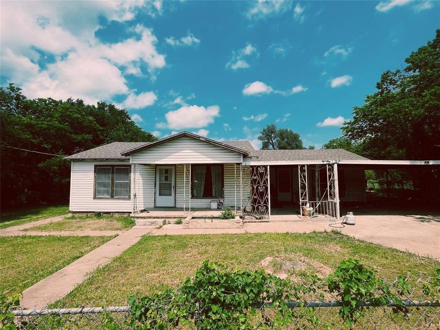 Great opportunity in an established Lake Worth neighborhood with strong underlying value in the layout, lot, and location. This home offers several features that are increasingly hard to find in this price range, including a split-bedroom arrangement, a large kitchen and dining area with abundant storage and workspace, and generously sized bedrooms and bathrooms with good storage throughout. The front living area is filled with natural light from its many windows, and the large hall bath adds to the home’s functional appeal. Outside, the property offers a secure fenced yard and driveway with gated access, a 3-car carport, a large backyard, and a back porch that is perfect for enjoying a quiet morning or evening outdoors. The home does need work, but the value here is clear: a spacious and practical layout, a useful lot, and a convenient Lake Worth location with access to Lake Worth ISD, nearby parks, and local recreation like nearby Lake Worth Park offers athletic fields, a playground, and a skate park. The home is conveniently located about one mile from major shopping and restaurants.